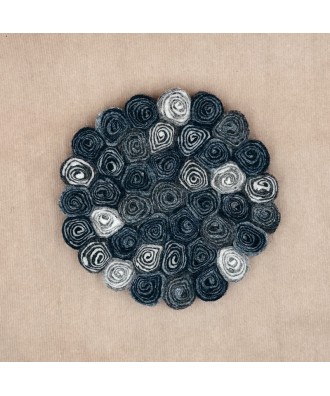 Dessous de plat rond en feutrine, spirales